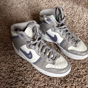 Nike jordans in Gray, White, and purple